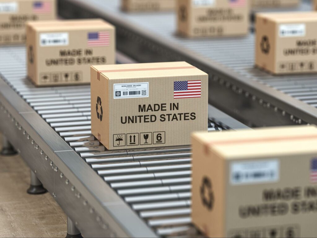 Boxes labeled Made in United States on an assembly line.