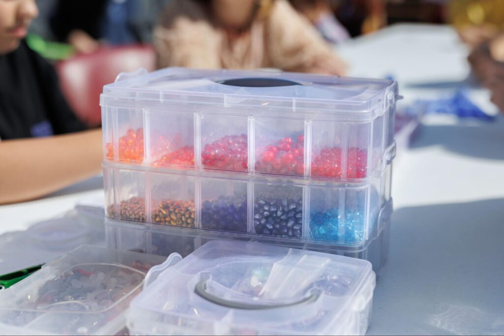 Colorful bead storage box, perfect for organizing crafting supplies and creative projects.