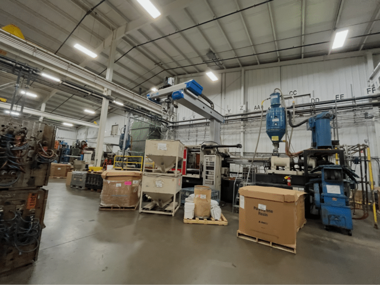 Modern warehouse interior filled with equipment and organized inventory for efficient operations.