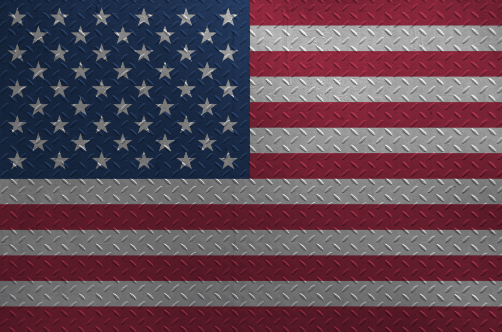 Metal texture featuring the American flag in red, white, and blue colors.