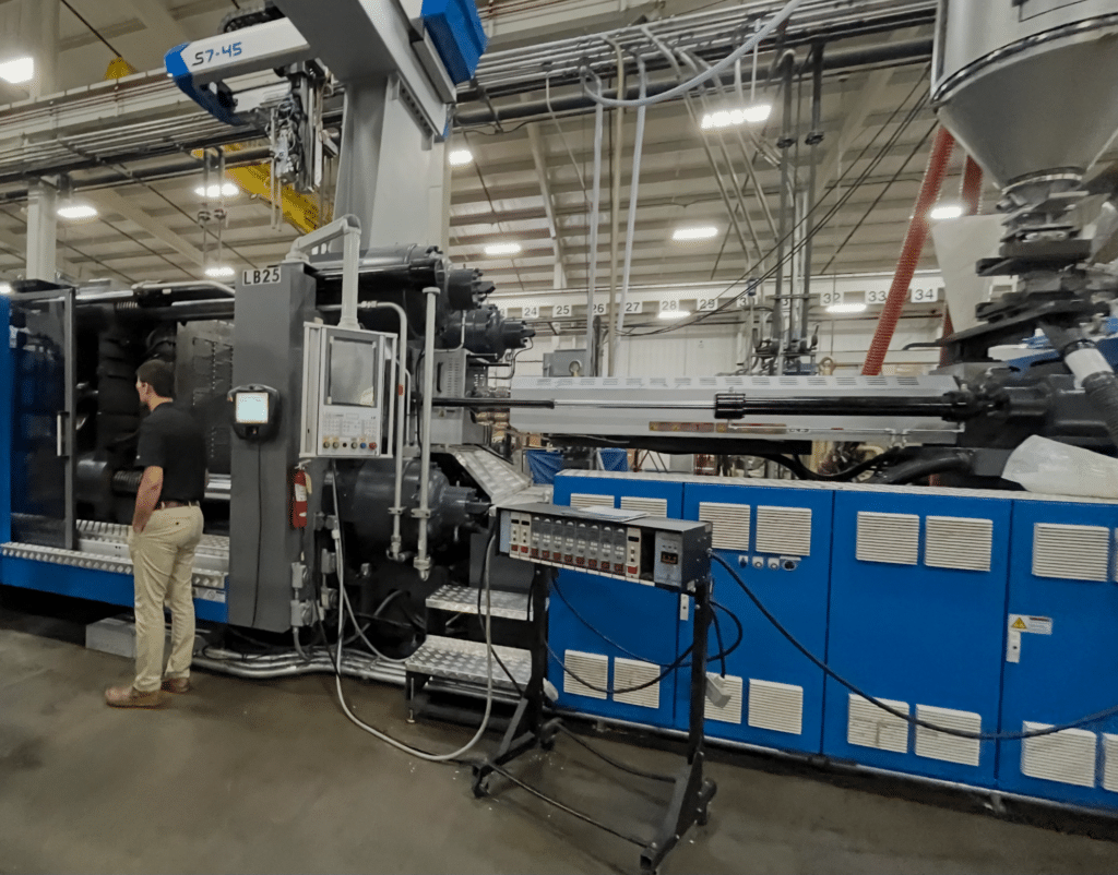 Automated production line with advanced machinery and operator monitoring equipment.
